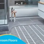 Heated bathroom floors with an electric radiant heating system installed beneath the tile flooring.